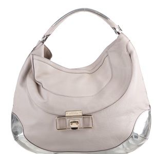 Description
•   Anya Hindmarch
 Gently pre-owned.